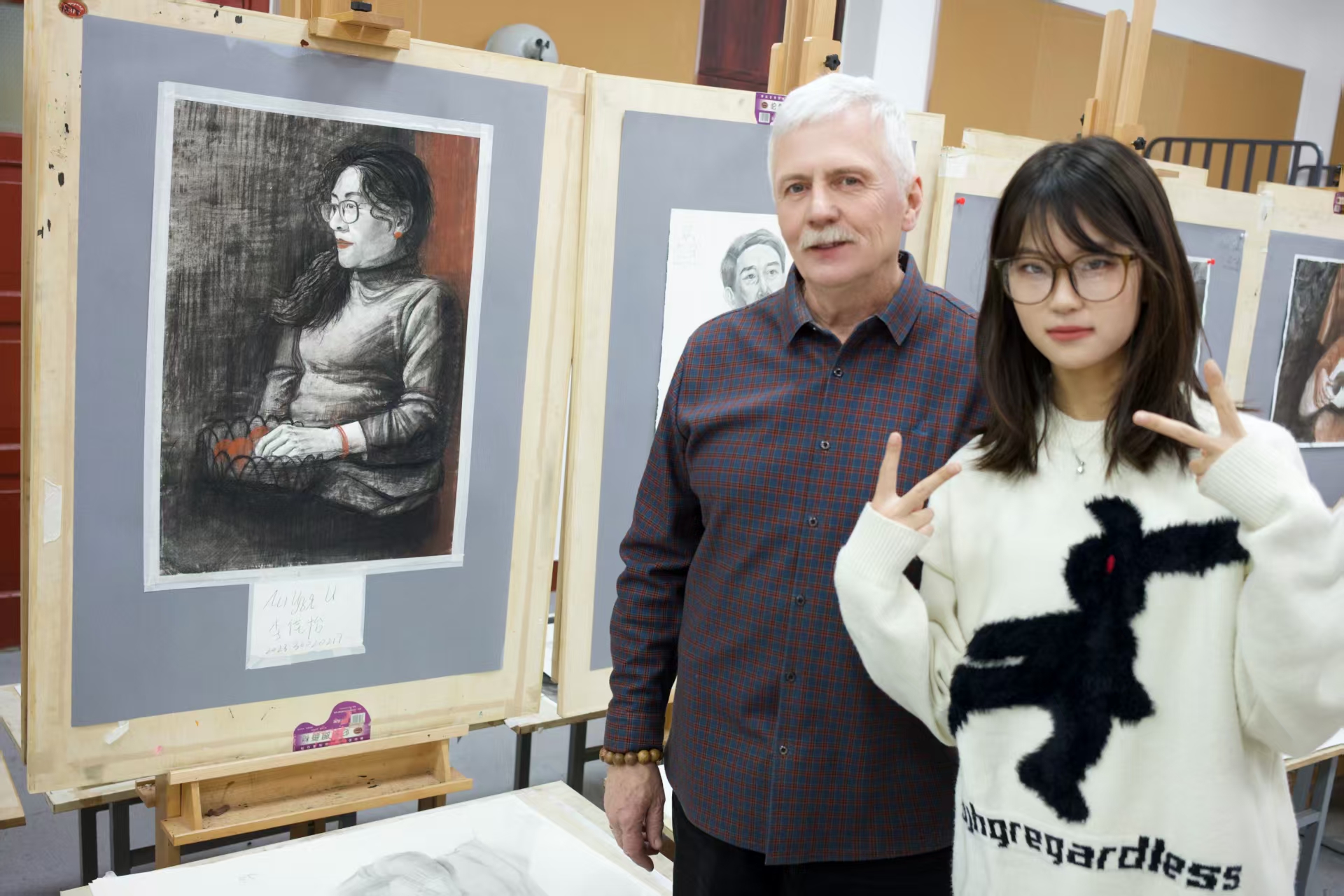Closing photo with Андрей beside a sketching work